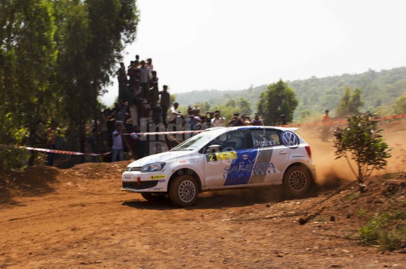 Karamjit Singh in the Volkswagen R2 Polo and the crowd Karamjit Singh in the Volkswagen R2 Polo and the crowd